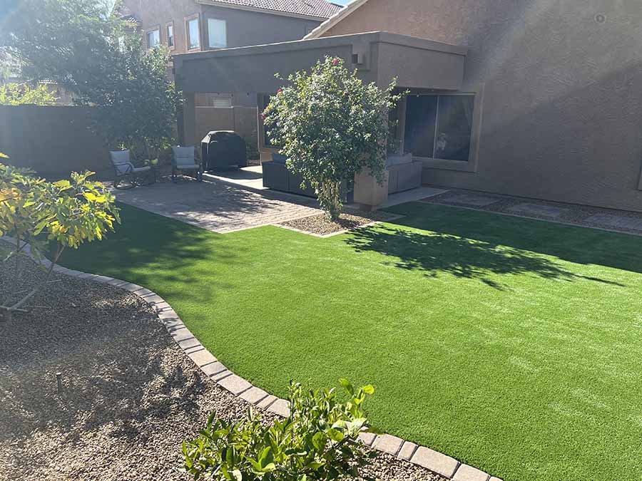 backyard install xeriscape with artificial turf